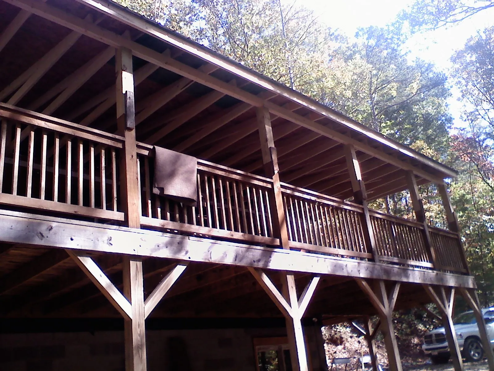 Timber framing under a new elevated porch and deck — Roof Leak Repair in Thorp by Roofing Brothers